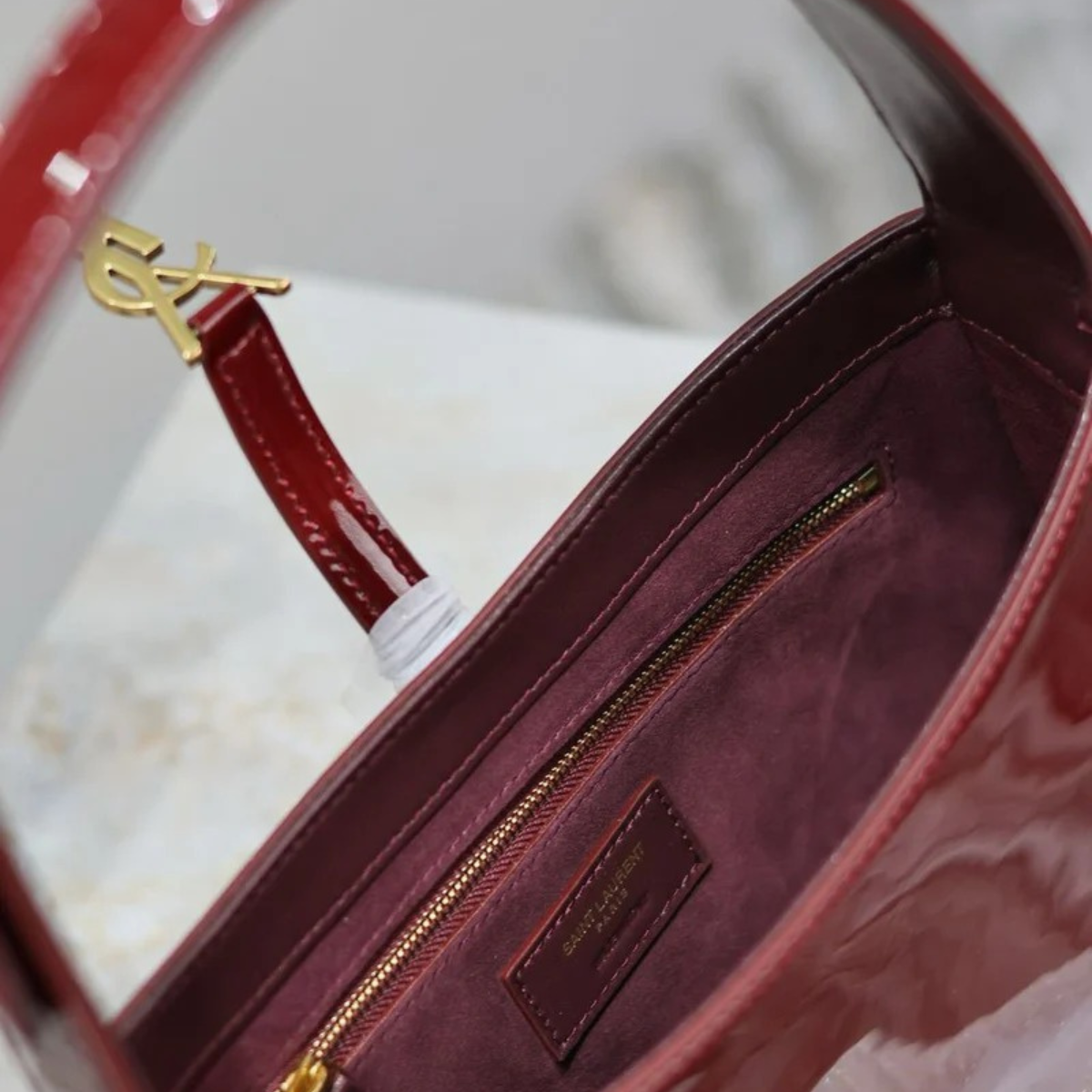Yves Saint Laurent – Le 5 à 7 bag in patent leather
