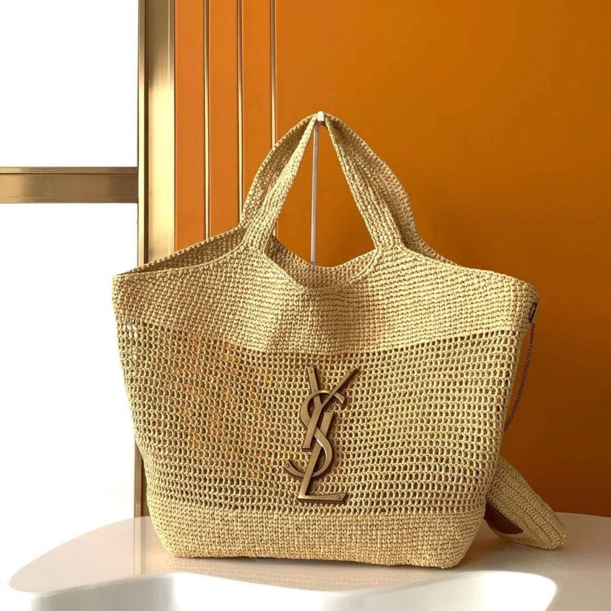Yves Saint Laurent – Icare bag in raffia