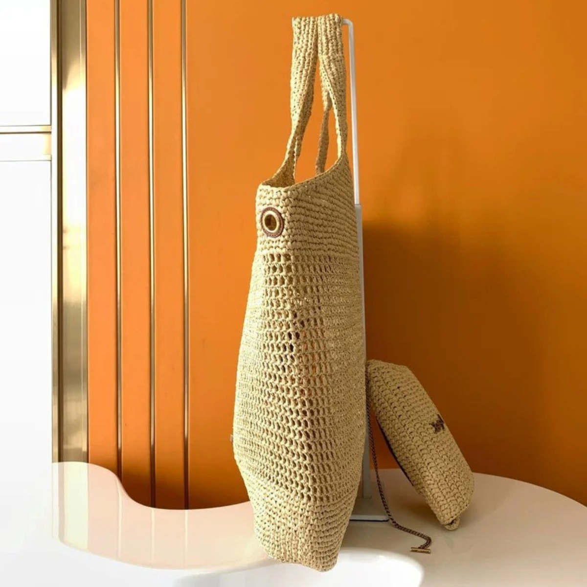 Yves Saint Laurent – Icare bag in raffia