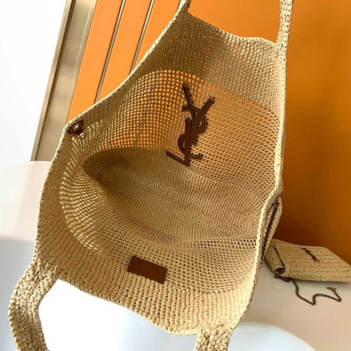 Yves Saint Laurent – Icare bag in raffia